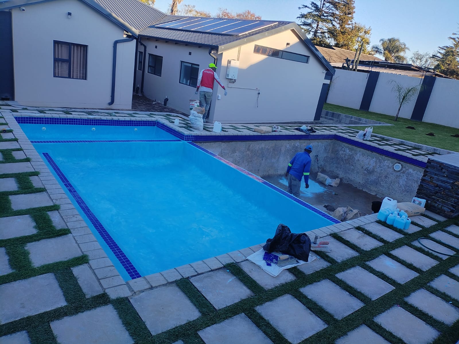 Finished pool alongside a second feature under construction